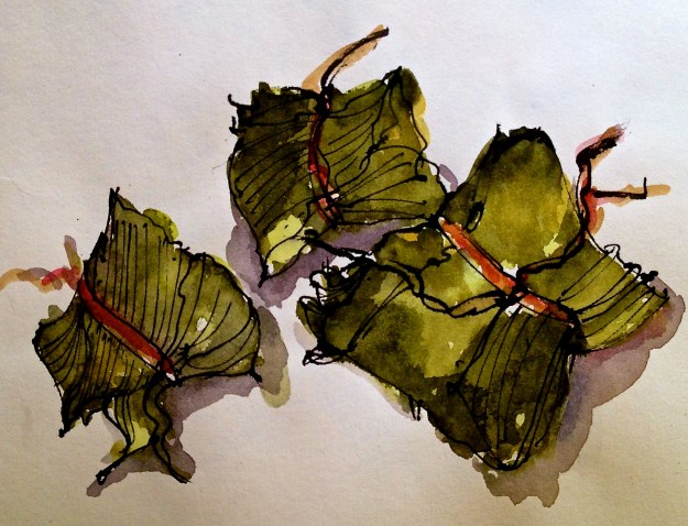 Sticky rice dumplings wrapped in bamboo leaves