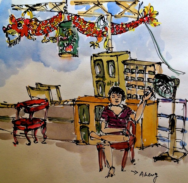 Aheng who's taking it easy with a cigerette between his fingers, is actually the temple's spirit medium who goes into a trance twice a week and offers consultation to devotees on their issues ranging form medical, marital to spiritual.