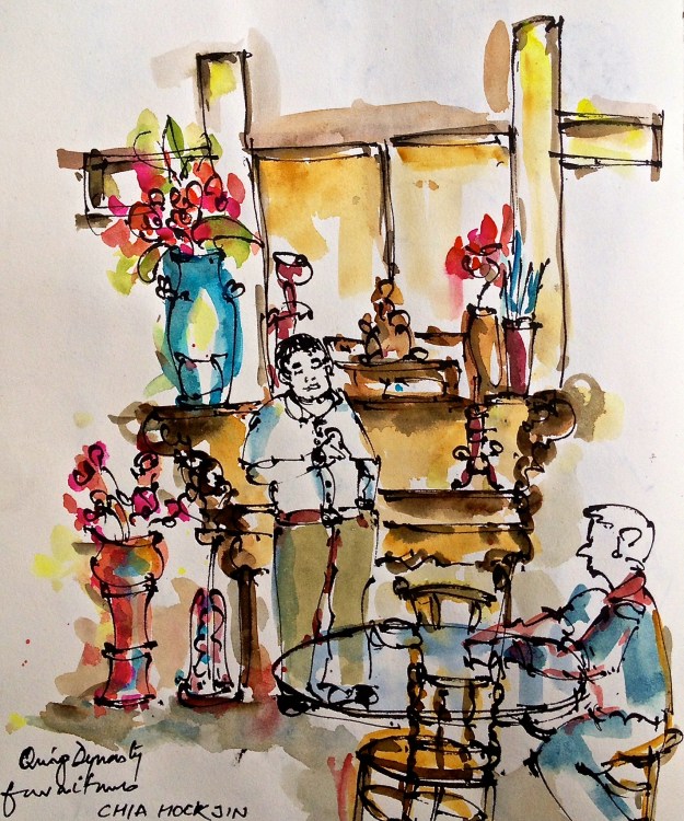 Hock Jin standing in front of the Living Room alter