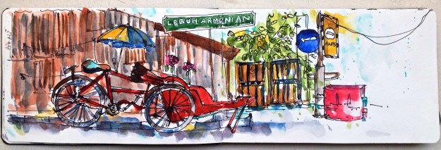 A Red Trishaw parked on Armenian Street